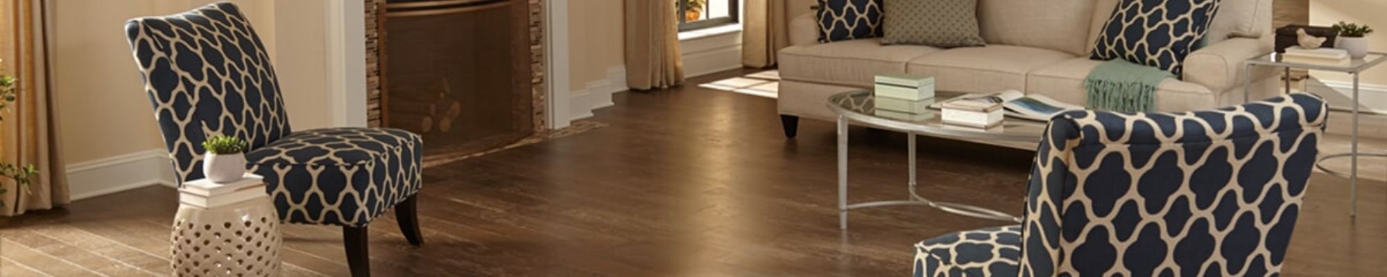 two armchairs in living room with brown hardwood from Johnson & Sons Flooring in Knoxville, TN